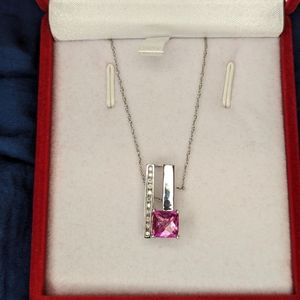 10 k gold pendant with diamond and Sapphire.